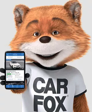 Car Fox holding a mobile phone with 5 star reviews for a dealership